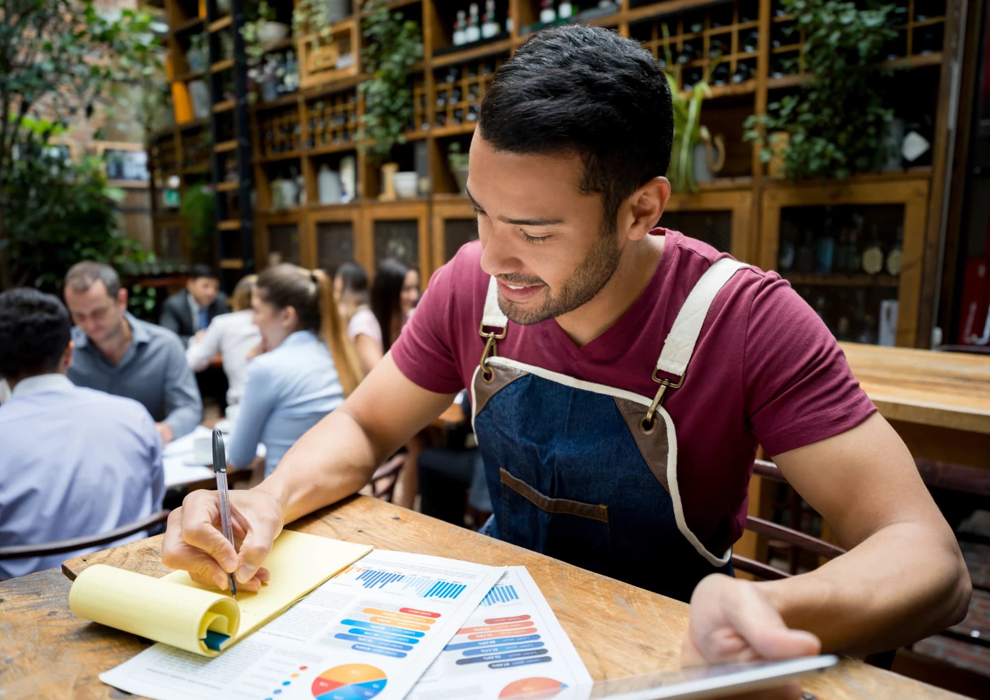 Service provider planning bookings at a table